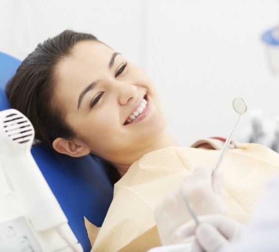 Young woman smiling during dental checkup