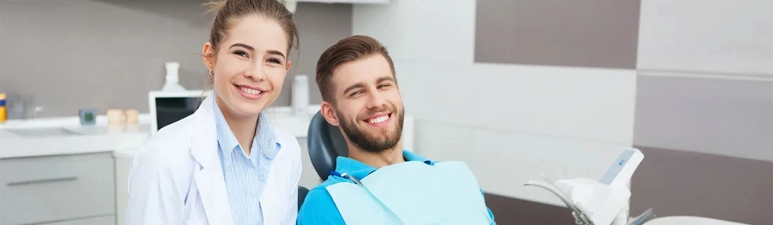 Dentist Windham ME Frequently Asked Questions Dentist and Patient Smiling Frequently Asked Questions Dentist and Patient Smiling